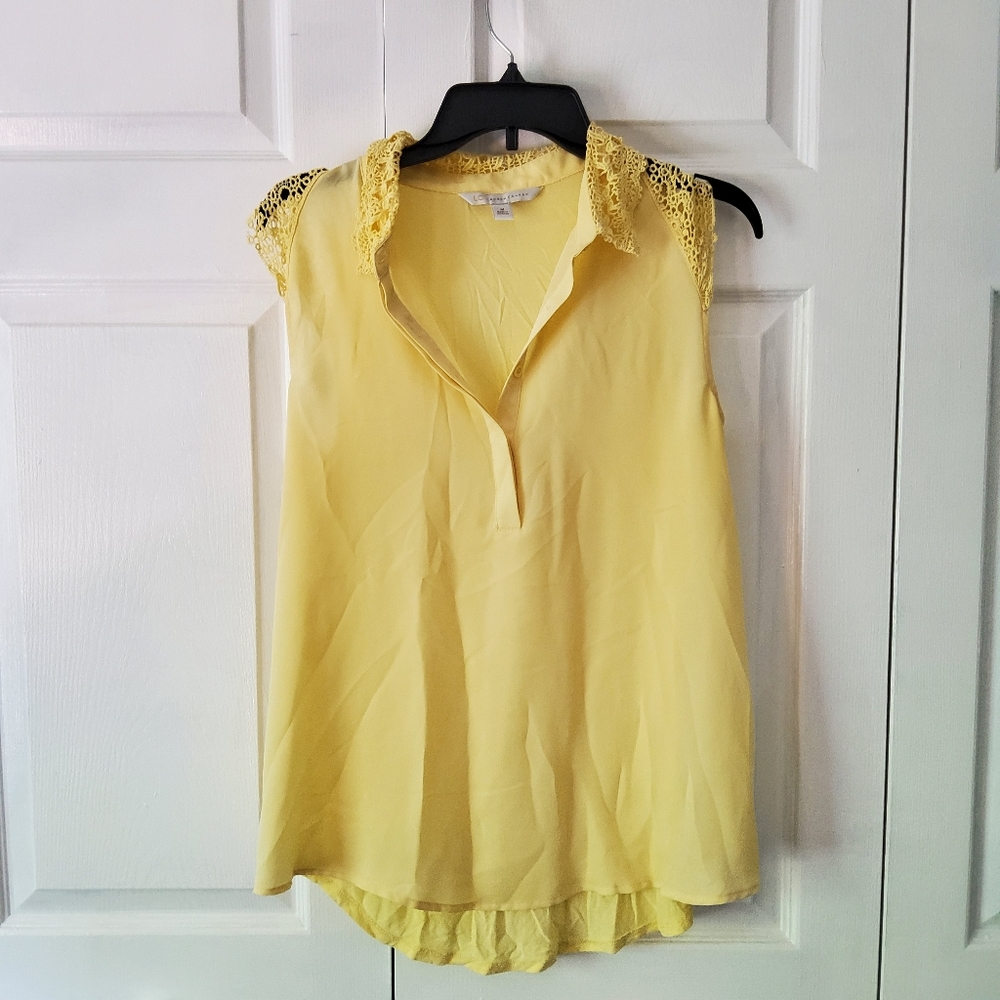 Yellow sleeveless top